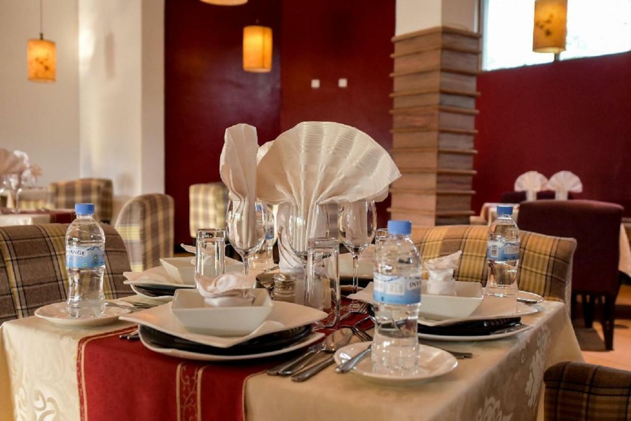 Orient Park Hotel Кігалі Екстер'єр фото